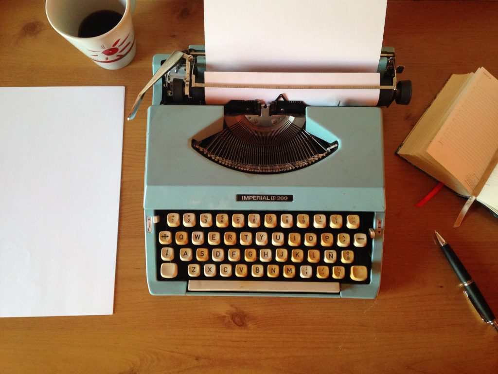 Typewriter representing copywriting services from Little Bird Creative