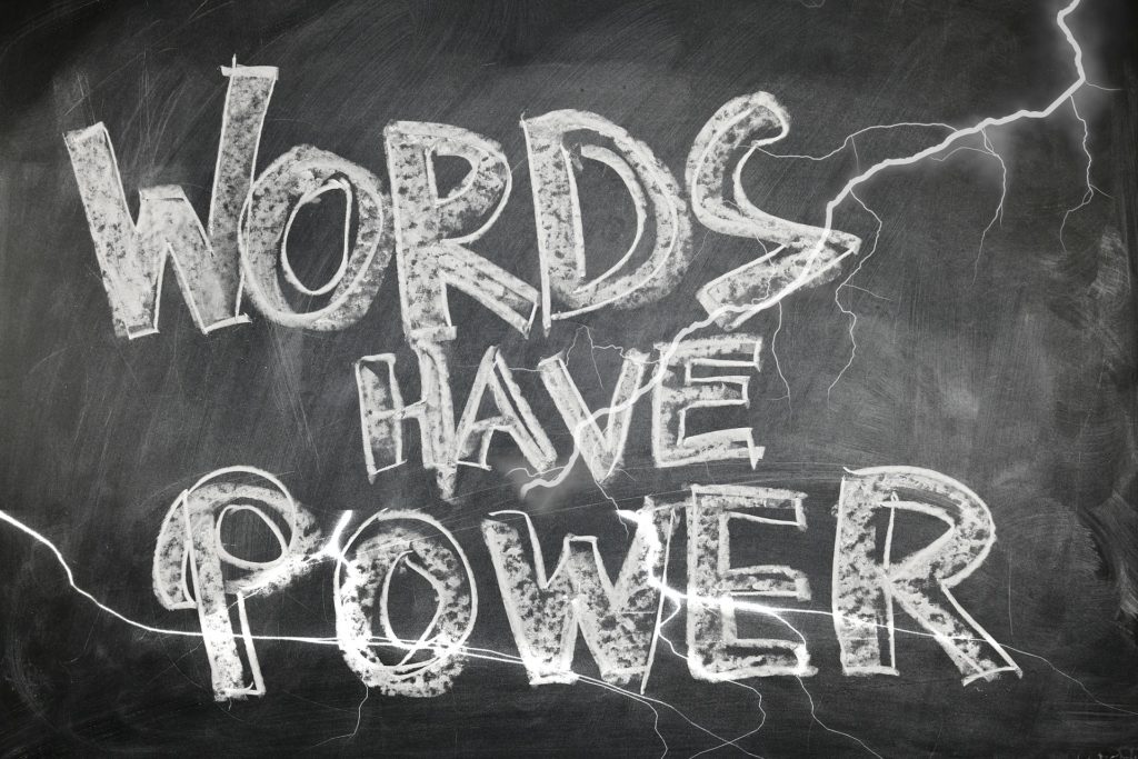 chalkboard with "words have power" written on it