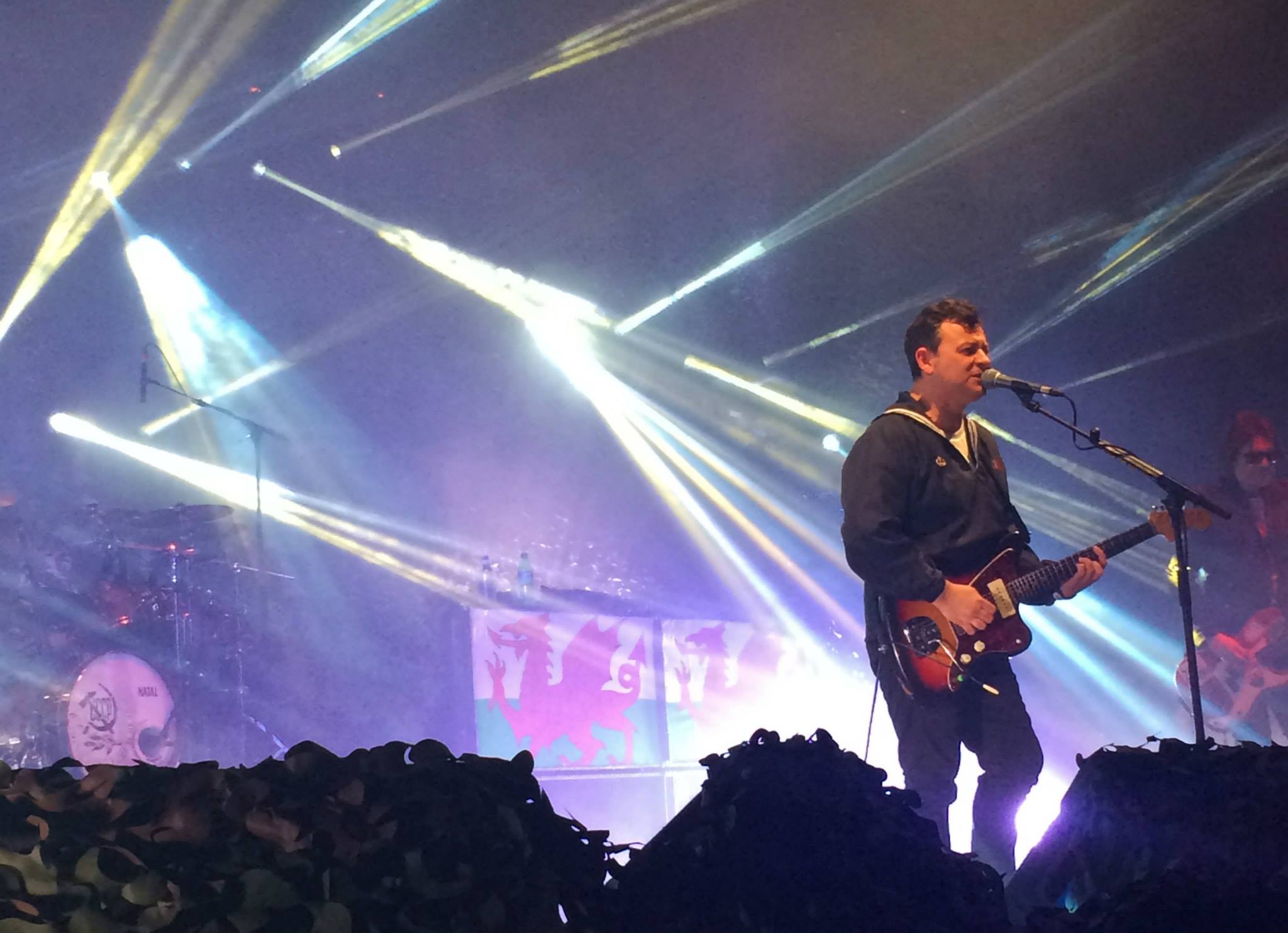 James Dean Bradfield of the Manic Street Preachers performing on stage.