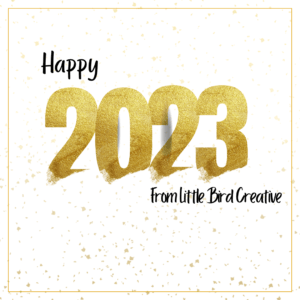 Gold numbers spelling out 2023 on a white background with gold glitter falling. Text reads "happy 2023 from Little Bird Creative.